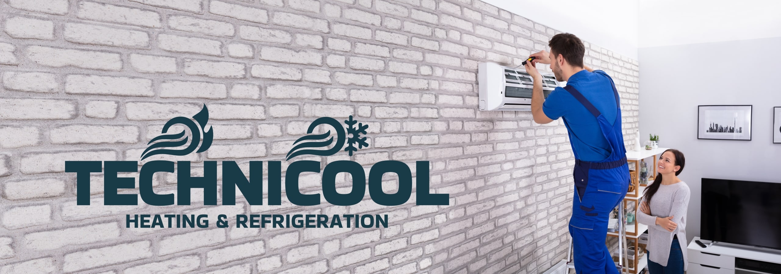 TechniCool tech working indoors on a mini-split mounted on a white brick wall.